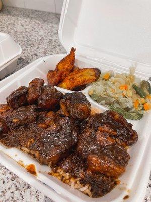 Dinner size oxtail over rice, cabbage, plantains, THE BEST