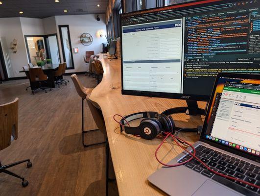 Floating, shared desk area