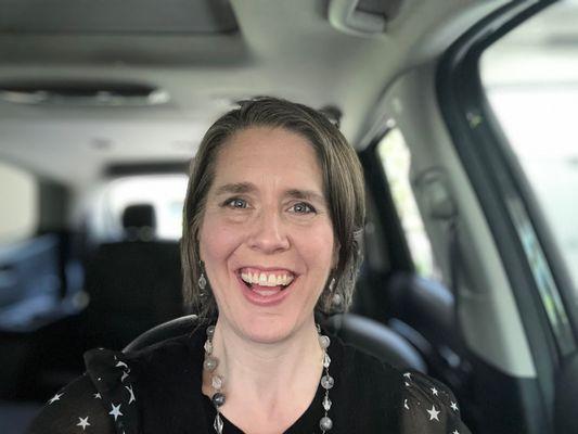 North Seattle Realtor Emily Cressey driving to another listing appointment!