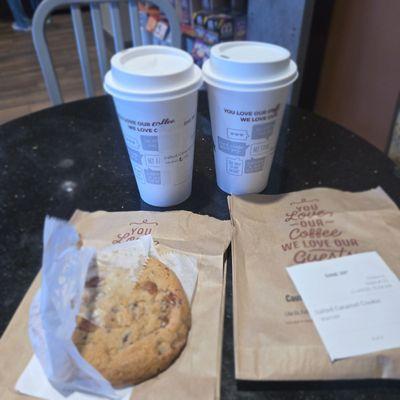 Order a season drink for myself and a black coffee for my girlfriend and two cookies