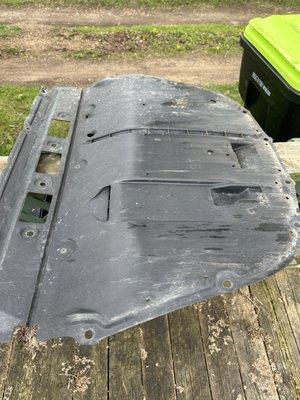 This is the dust shield that I'm talking about. This oil change was done yesterday. At least it didn't fall off on the road.