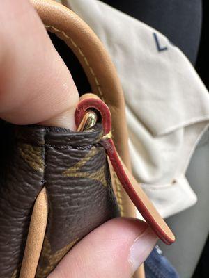 Stitching unraveling on what's supposed to be a high quality bag