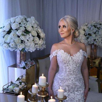 Fabulous,pretty and nice girl blond hair updo with smoke eyes totally glamour for wedding day in Beverly Hills.