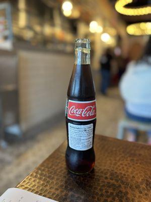 They have bottles of Mexican Coke for sale.