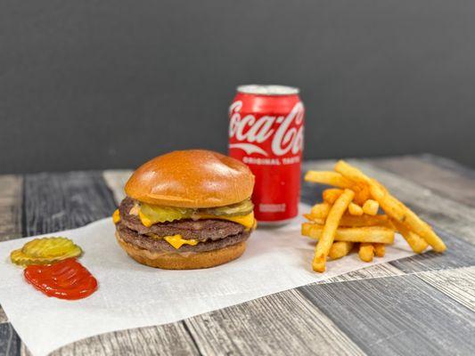 Double cheeseburger combo with crispy fries and an ice-cold Coca-Cola--classic, juicy, and 100% halal.