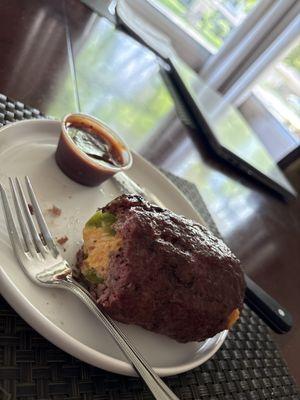 This is the Texan Armadillo. Cheddar Jalapeño stuffed in Brisket.