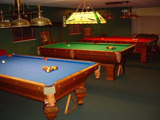 21 Brunswick Tables, eleven of which are Century Old Billiard Tables in Museum Quality Condition, available for just $6 per person per hour!