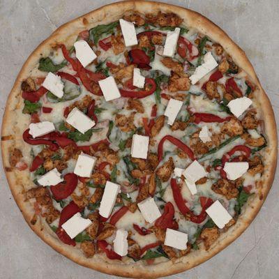 Mediterranean pizza with grilled chicken