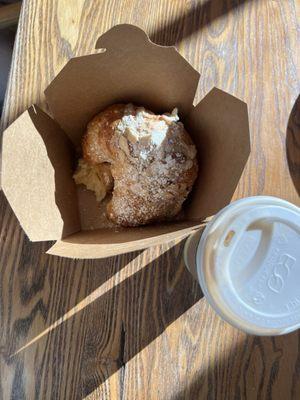Almond croissant and a honey latte