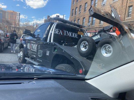 Just cut us and a whole bunch of other people off, jumping out of the car to threaten us so he could park in the middle of a lane.