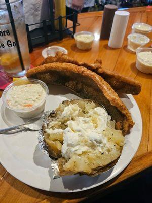 A Wisconsin walleye dinner with baked potato and all fixings