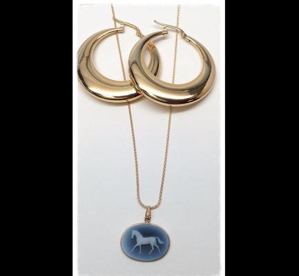 Horse cameo and 14 karat gold hoop earrings.