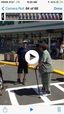 Tow driver having crippled lady with cane beg to not have car towed . He did not put the car down until I videoed him