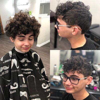 Calmed this wild hair of curls down. Done by Hanna