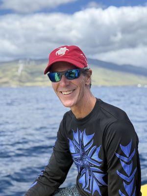 My husband wearing a Dry Fit long sleeve Size Small.. normally he wears a medium. Great for his paddling and sun protection.