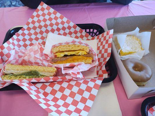 Pesto and turkey panini, sausage and cheese panini, lemon bar and maple doughnut