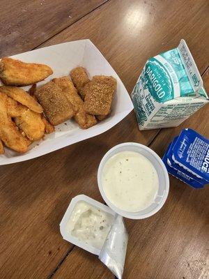 Fish nuggets and jojos.