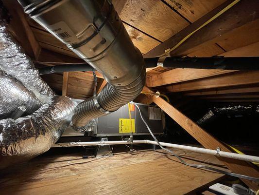 Addition of a full hybrid system and air ducts. There wasn't much space in the attic, but we did it!