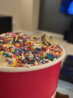 Cheesecake, cake batter & chocolate cookie with rainbow sprinkles and one cookie dough topping.