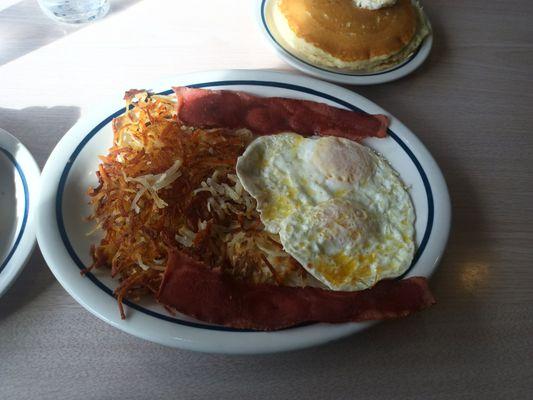 Quick 2-egg with turkey bacon, over medium