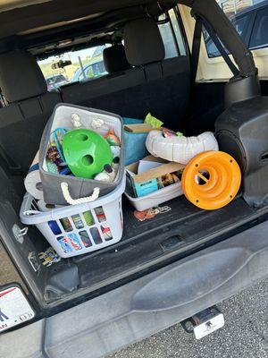 Dropping off much needed donations. They are in desperate need of newspapers