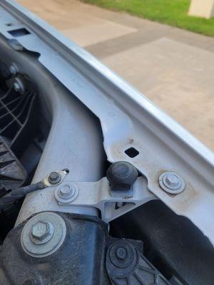 Bolt painted- they painted the hood without taking it off - lazy work!