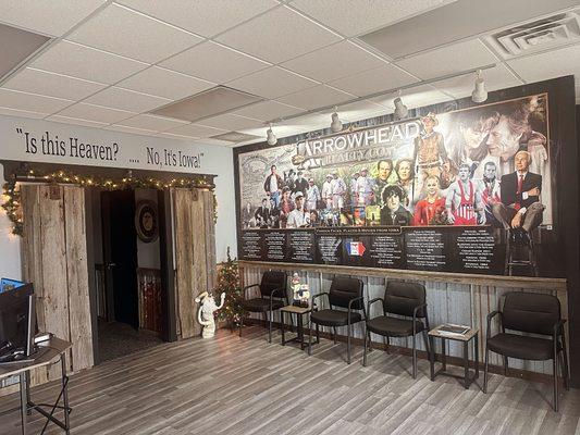 Stop in to see our wall size mural of Famous faces, Places & Movies from Iowa