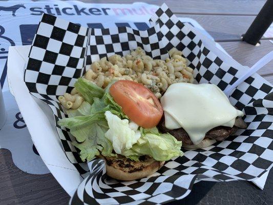 The cheeseburger with grilled onions and grilled mushrooms. Mac Salad for the side with peas and carrots.