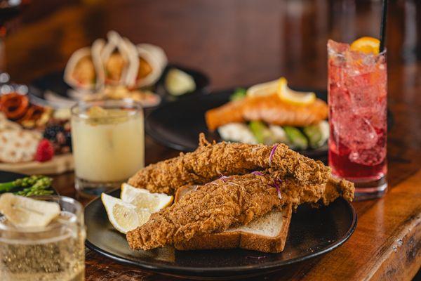 Cornmeal dusted catfish served with Texas toast and Charr'd barrel-aged hot sauce. Served with cole slaw & beer-battered fries