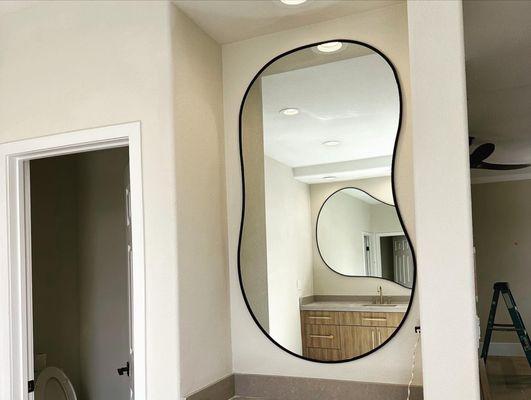 Custom framed puddle mirror