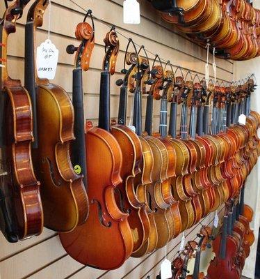 Walls of instruments ready to rent or purchase! We're here 4 you!