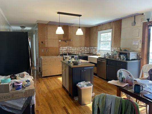 This is how he left my kitchen. The rest of the cabinets are in boxes in the hall.. I had to hire another company to finish the job.