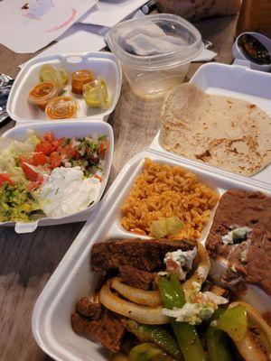 Beef fajita plate with rice and beans. Home made corn Tortillas! A little pricey for the amount you get. All was fresh and delicious