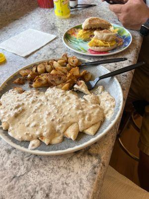 Sausage Gravy over Flatbread w/Home Fries, and the Special ShopMuffin!!