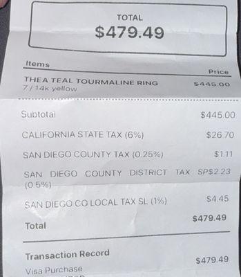 My receipt for the ring with a tourmaline stone center and diamonds on the side.