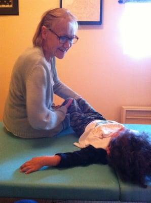 Ruby Love giving an Anat Baniel Method lesson to child
