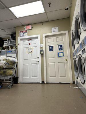 Bathroom no longer free it seems or currently working.  At least there is a cute dog hanging out!