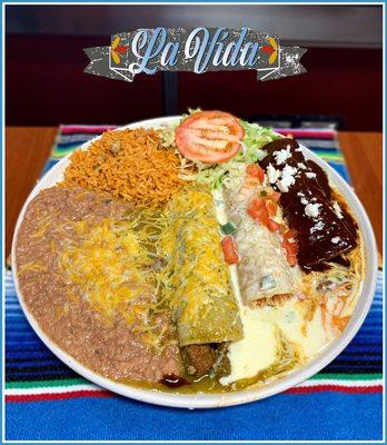 Fiesta Enchiladas, covered with mole sauce, creamy salsa and green salsa; with your choice of meat.