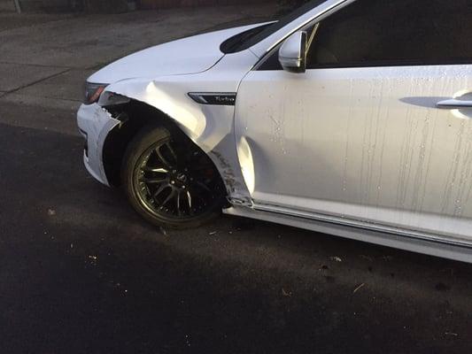 News paper boy driving on the wrong side of the road