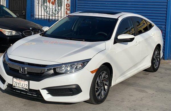 Honda Civic.. front left was repaired. Car looks brand new !!!!