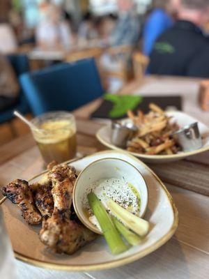 Grilled Wings and Truffle fries with Parmesan.