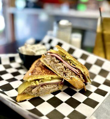 Medianoche sandwich with potato salad side