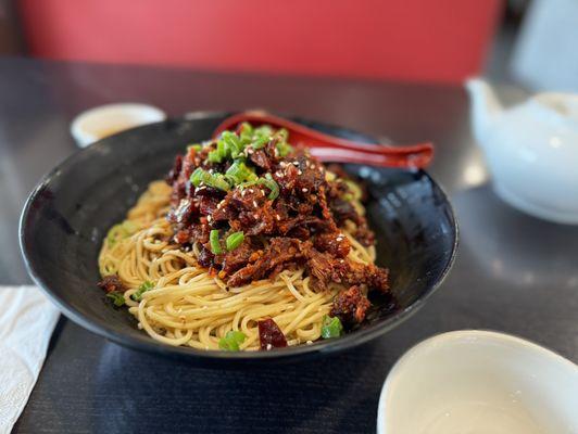 Hot and Spicy Beef Noodle (no broth, on menu is the dry version). Good