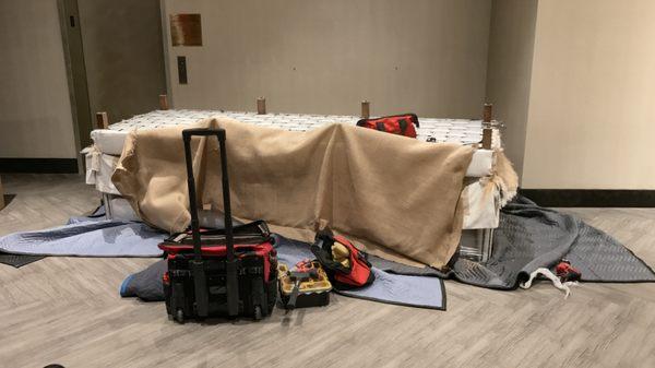 Fit My Couch © Inc at work.
Sofa is apart and ready to go inside the elevator.