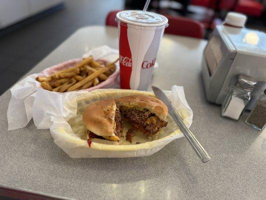 Bacon cheeseburger with fries and iced tea