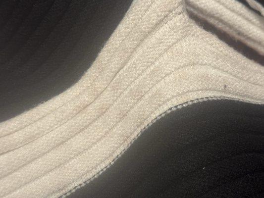 This is what was returned to me. My beautiful sweater is ruined.