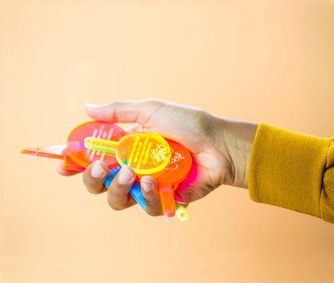 Lollipop Laser can laser cut and engrave business cards, conference and event badges, key chains and jewelry in any material.