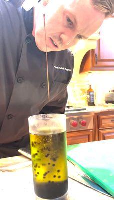 Making balsamic pearls in chilled olive oil for a unique spin on a caprese salad that was incredible