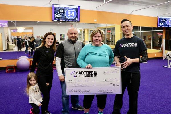 Winner with the Manager, Assistant Manager and a Trainer!