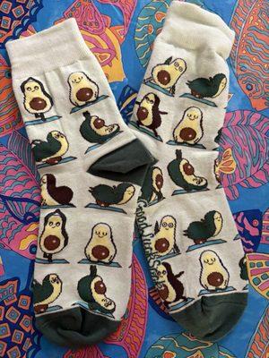 Small store with 3 types of avocado socks and I selected the exercising avacados